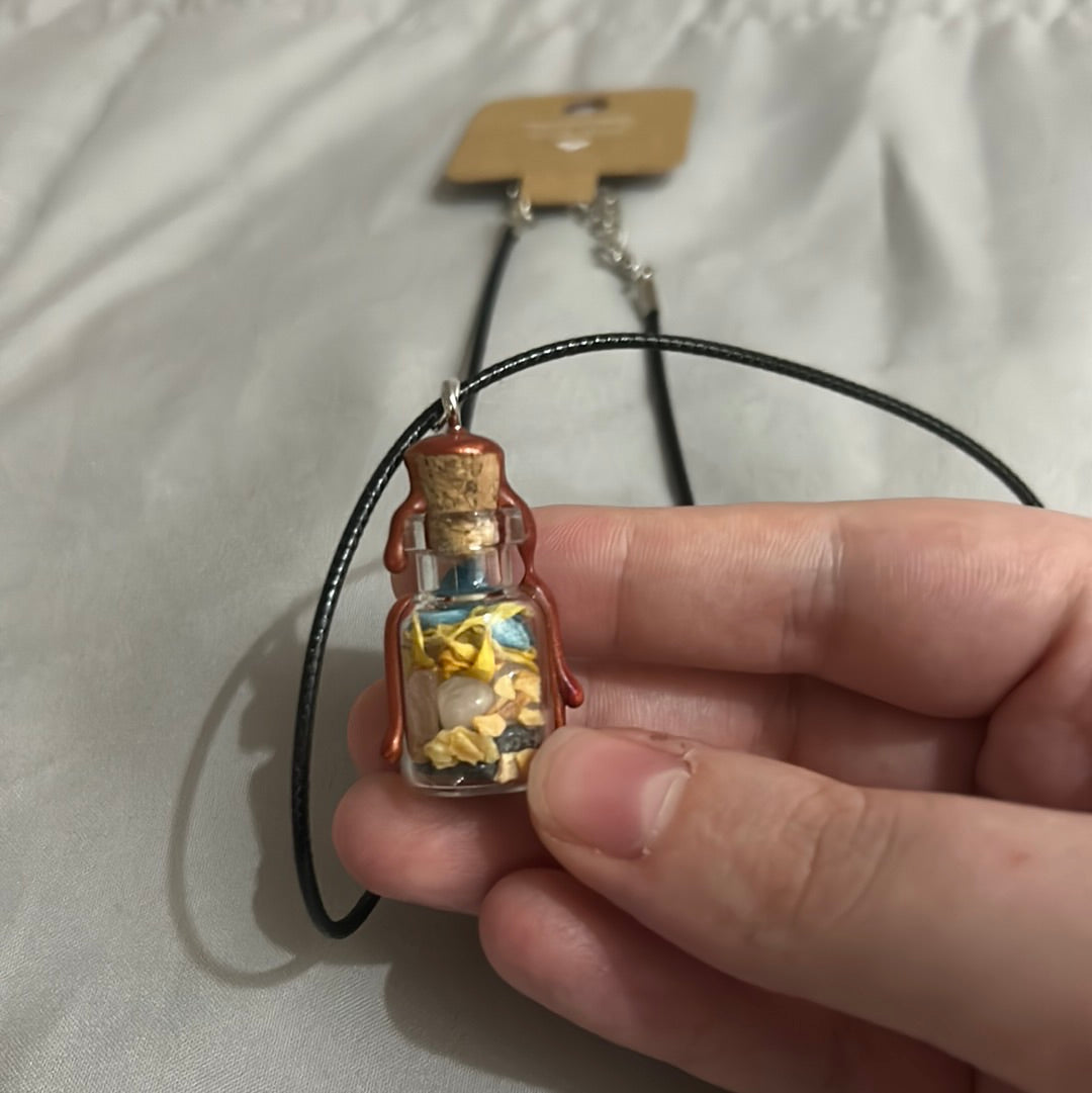 Bijoux en forme de pot à sorts